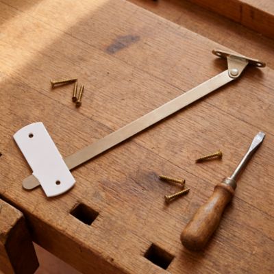 2 compas coulisseaux avec arrêt relevable L. 207 mm