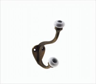 Patère en zamak effet rouillé à fixer 1 tête en porcelaine Bar Plus