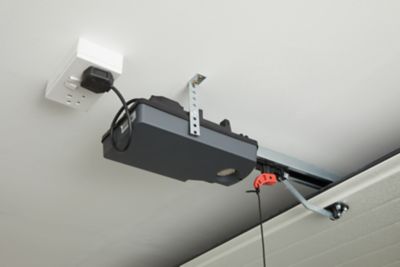 Motorisation pour porte de garage sectionnelle