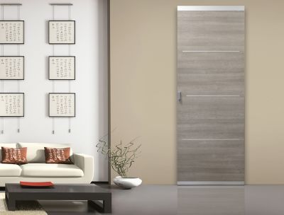 Système coulissant pour pose invisible porte en bois