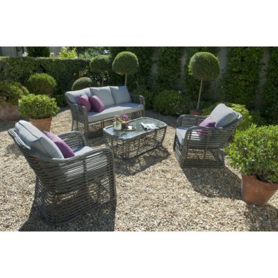 Canapé avec coussins + table basse Brizo