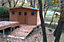 Abri de jardin Habrita Thermabri en bois coloris naturel ép.28 mm surface extérieure 24,30 m²