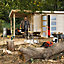 Abri de jardin + pergola Skara en bois coloris natuel ép.28 mm surface extérieure 10,65 + 5,51 m²