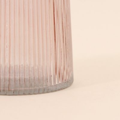 Bougeoir en verre strié rose 19cm