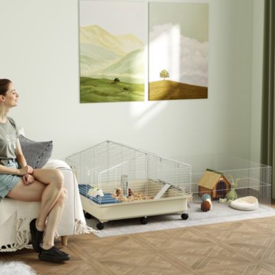 Cage pour petits animaux avec parc en plastique multicolore sur roulettes