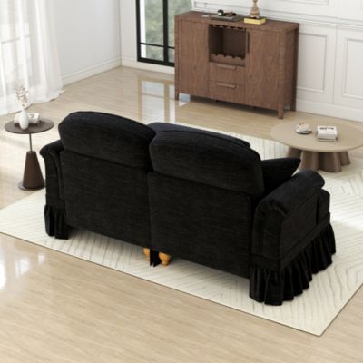 Canapé 2 places en chenille noir avec volant amovible et pieds fuselés, accoudoirs floraux et design modulable