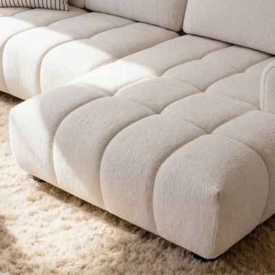 Canapé d'angle gauche en tissu beige Syrel