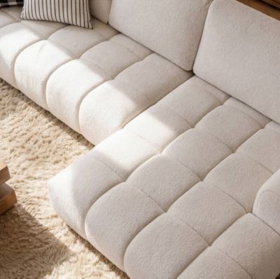 Canapé d'angle gauche en tissu beige Syrel