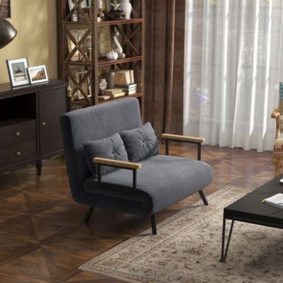 Canapé-lit en velours gris foncé avec coffre de rangement, coussins de dossier et design compact