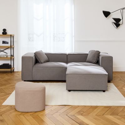 Canapé modulable en tissu gris. 2-3 places déperlant. 2 corners + 1 pouf