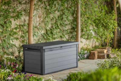 Coffre de jardin résine effet bois 570 L, l.151,7 x H.70 x P.72,5 cm, gris anthracite, Keter Cortina