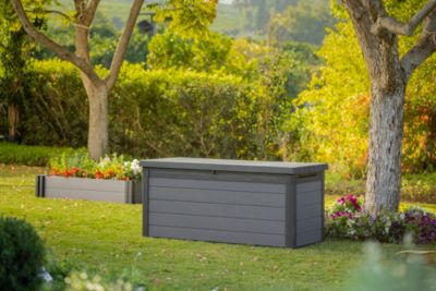 Coffre de jardin résine effet bois 570 L, l.151,7 x H.70 x P.72,5 cm, gris anthracite, Keter Cortina