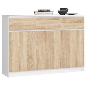 Commode AKORD K140 Blanche 138 cm 3 portes 3 tiroirs façade Chêne Sonoma 6 étagères 138x40x99 cm