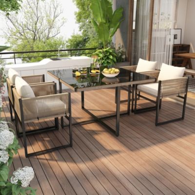 Ensemble table et chaises de jardin 4 places en acier, polyester, verre et corde avec coussins beige