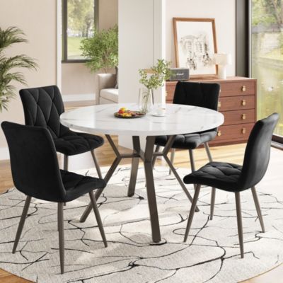 Ensemble table ronde 100x75 cm avec 4 chaises velours, plateau MDF effet marbre et structure métal noir