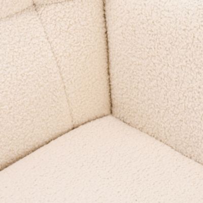 Fauteuil à bascule en tissu teddy beige avec dossier capitonné, design cosy et moderne pour salon ou chambre