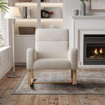 Fauteuil à bascule en tissu teddy beige avec poches latérales, assise large et patins antidérapants silencieux