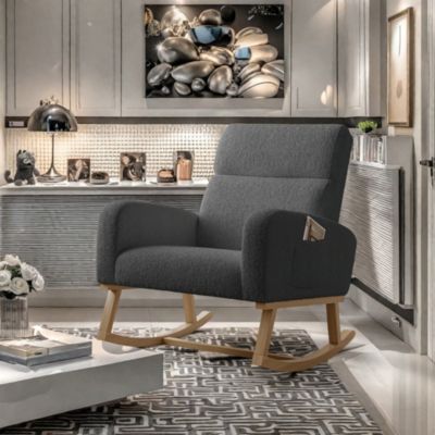 Fauteuil à bascule en tissu teddy noir avec poches latérales, assise large et patins antidérapants silencieux