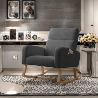 Fauteuil à bascule en tissu teddy noir avec poches latérales, assise large et patins antidérapants silencieux