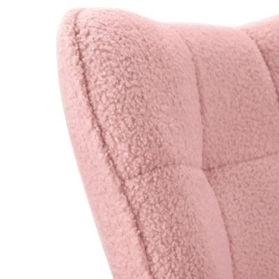 Fauteuil à bascule en tissu teddy rose avec dossier capitonné, design cosy et moderne pour salon ou chambre