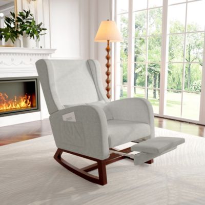 Fauteuil à bascule gris en lin avec repose-jambes extensible, poches latérales et coussin inclus