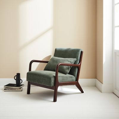 Fauteuil velours côtelé vert . pieds bois d'hévéa teinté wengé. 1 place droit fixe. pieds compas scandinave. structure en bois