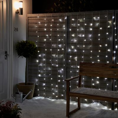 Guirlande lumineuse rideaux intérieur et extérieur 240 LED blanc glacé IP20 et IP44 3.6W L.13.5m câble transparent