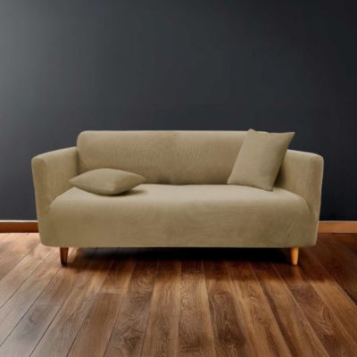 Housse de canapé extensible en polyester gaufré coloris beige