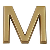 Lettre dorée "M" en relief