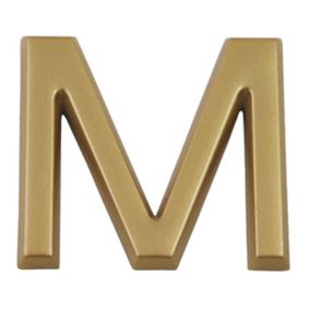 Lettre dorée "M" en relief