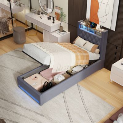 Lit simple 90x190 cm rembourré gris avec tête de lit LED intégrée et espace de rangement, sans matelas