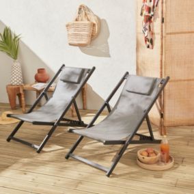 Lot de 2 bains de soleil - Gaia gris - Transat en aluminium gris anthracite et textilene gris avec coussin repose tête. chilienne