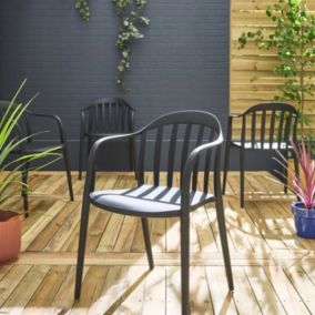 Lot de 4 fauteuils de jardin plastique noir. empilables