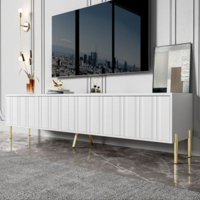 Meuble TV 190x38x48 cm avec rangements et pieds dorés, portes rainurées pour un style moderne