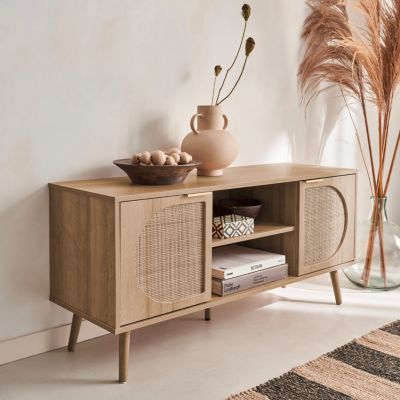 Meuble TV. Eva. décor bois et cannage arrondi 2 portes. 1 étagère L120 x l39 x H56.5cm