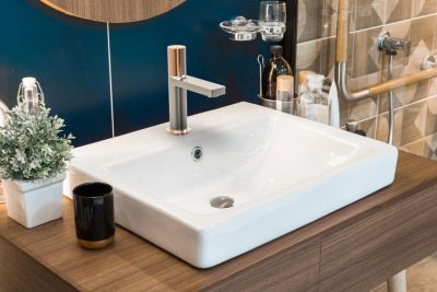 Mitigeur lavabo façon inox et or rose Essebagno Exil