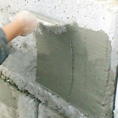 Mortier écran d'étanchéité (20kg, Blanc). Imperméabilisation pour façades, murs, piscines, réservoirs d'eau. Prévient fuites d'eau