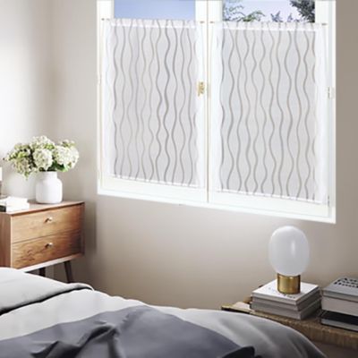 Paire de voilages dévoré passe-tringle 60x160cm blanc Dylrev pour un intérieur élégant