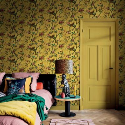 Papier peint Bloom vinyle intissé oiseau paradis jaune moutarde