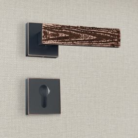 Poignée de porte design à cylindre finition aspect cuivre patiné noir Flora - KATCHMEE