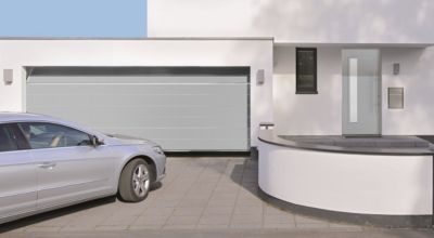 Porte de garage sectionnelle acier Hormann WoodGrain blanc aluminium RAL 9006 - l.250 x h.200 cm - motorisée