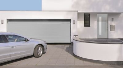 Porte de garage sectionnelle acier Hormann WoodGrain blanc aluminium RAL 9006 - l.250 x h.212,5 cm - motorisée