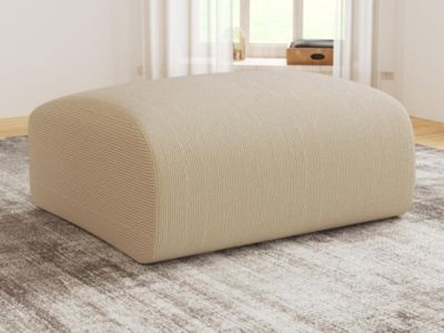 Pouf en tissu texturé beige POGNI de Maison Céphy