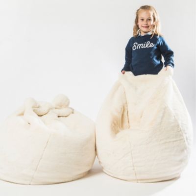 Pouf fausse fourrure et polyester collection SOFT ANIMALS rose avec remplissage