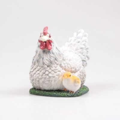 Poule couvant avec poussin en résine 17x23x19 cm