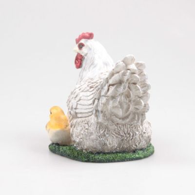 Poule couvant avec poussin en résine 17x23x19 cm