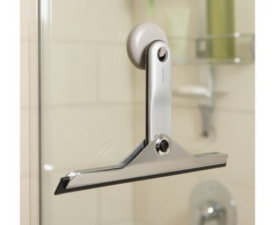 Raclette de douche pliable aluminium et zinc Simplehuman