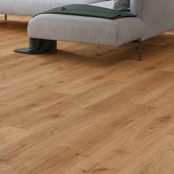 Sol stratifié Cortland GoodHome, passage élevé AC4, effet chêne miel, L.128,5 cm x l.19,2 cm x ép.8 mm, résistant à l'eau