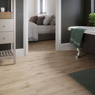 Sol stratifié Lulea GoodHome, passage élevé AC4, effet chêne blond, L.129,2 cm x l.24,6 cm x ép.8 mm, résistant à l'eau