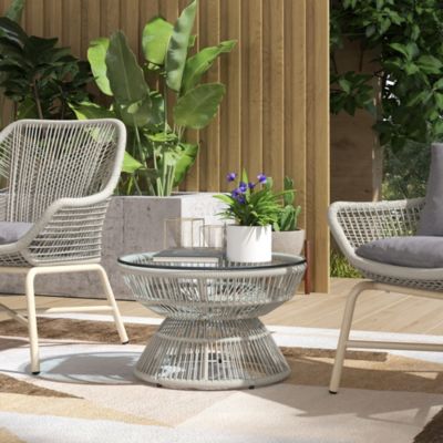 Table basse de jardin ronde résine aspect rotin plateau verre gris